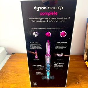 Brand new, never opened Dyson air wrap complete